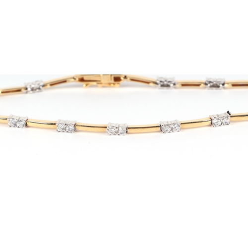 631 - An 18ct gold diamond set bracelet, 7.4g.
Length- 7.5inches