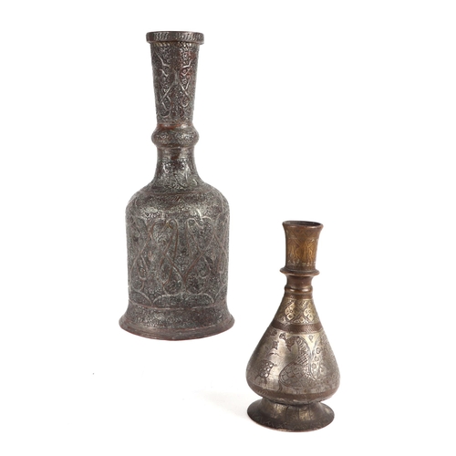 635 - A tinned copper hookah pipe base, 32cms high; together with another similar, 20cms high (2).