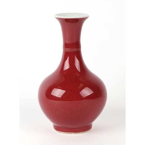 640 - A Chinese sang de boeuf baluster vase, 15cms high.