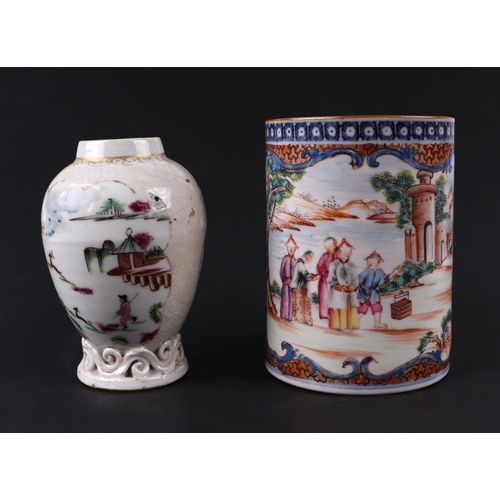 648 - An 18th century Chinese Mandarin mug decorated with figures in landscapes within panels, 11cms high;... 