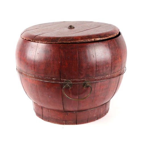 652 - A Chinese red lacquered rice bucket and cover, approx 45cms diameter.