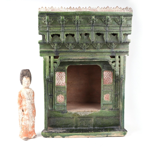 653 - A Chinese green glazed pottery altar, 30cms wide; together with a Chinese pottery funereal figure, 2... 