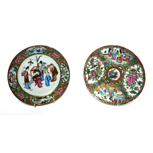 656 - A 19th century Canton Export famille rose plate decorated with figures within a landscape, 20cms dia... 