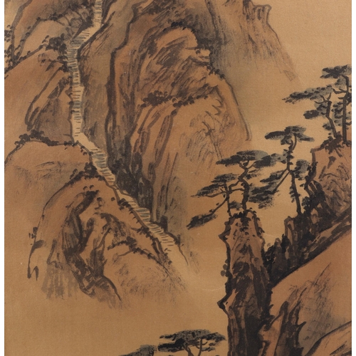 666 - A Chinese watercolour on silk depicting a mountainous landscape and calligraphy, framed & glazed, 20... 