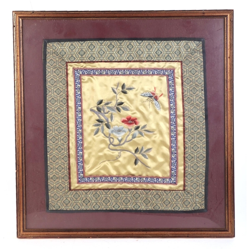 669 - A Chinese silk embroidered panel depicting flowers and a butterfly, framed & glazed, 20 by 23cms.