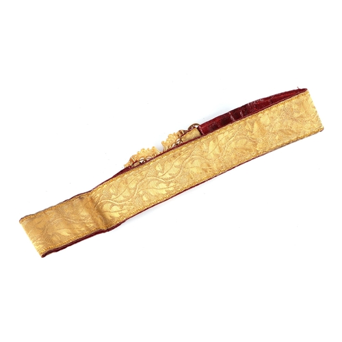 67 - An Army Educational Corp gilt metal buckle on a bullion wire and red leather belt.