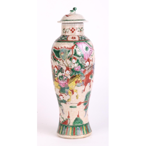 670 - A Chinese famille rose crackleware baluster vase and cover decorated with warriors, four character r... 