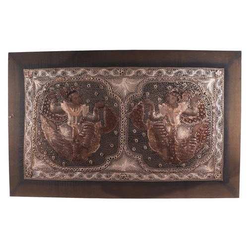 673 - A Thai textured bullion wire panel depicting two dancers, overall 108 by 68cms.