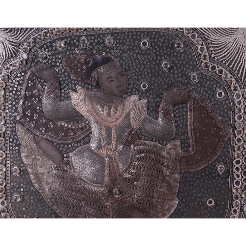 673 - A Thai textured bullion wire panel depicting two dancers, overall 108 by 68cms.