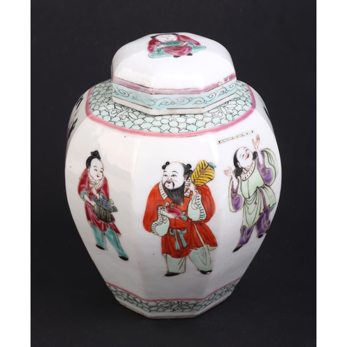 675 - A Chinese famille rose ginger jar and cover of octagonal form, decorated with figures, 15cms high.