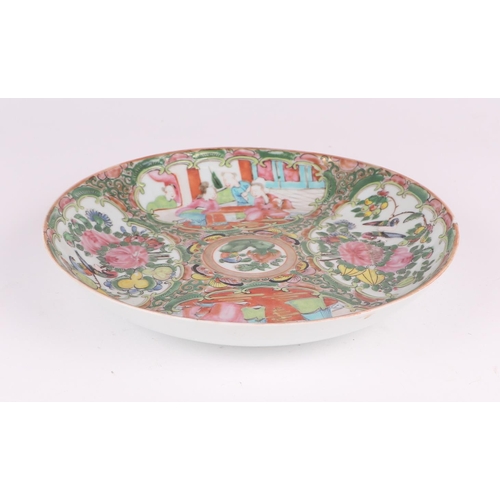 684 - A Chinese Canton Export famille rose shallow bowl decorated with figures and flowers within panels, ... 