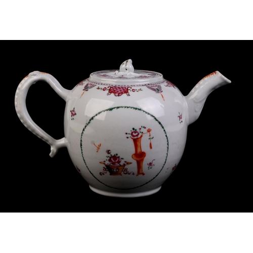 687 - A late 18th century Chinese hard paste porcelain teapot and cover decorated with flowers.