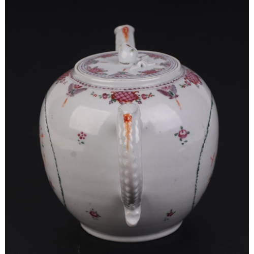 687 - A late 18th century Chinese hard paste porcelain teapot and cover decorated with flowers.