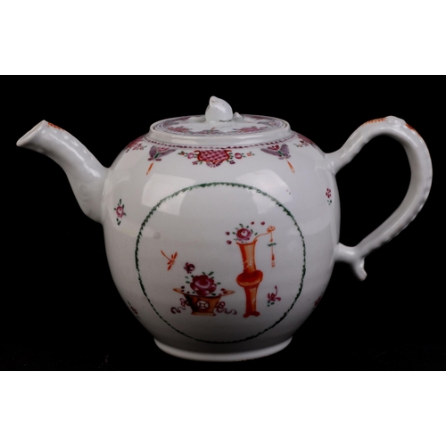 687 - A late 18th century Chinese hard paste porcelain teapot and cover decorated with flowers.