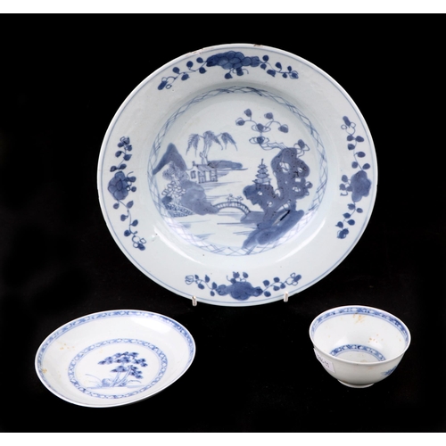 688 - A Chinese Nanking Cargo porcelain blue & white tea bowl and saucer, bears Christies lot label 5528; ... 