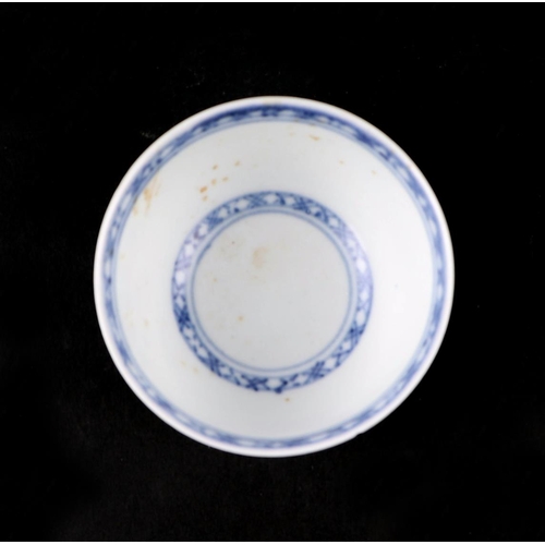 688 - A Chinese Nanking Cargo porcelain blue & white tea bowl and saucer, bears Christies lot label 5528; ... 