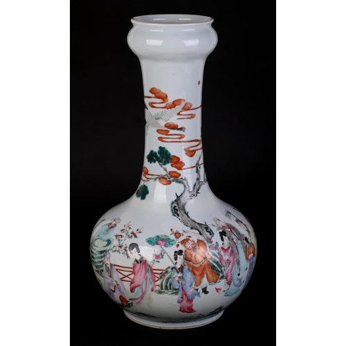 711 - A large Chinese famille rose bottle vase decorated with figures on a terrace, 43cms high.Condition R... 