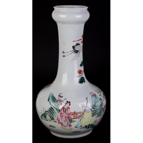 711 - A large Chinese famille rose bottle vase decorated with figures on a terrace, 43cms high.Condition R... 