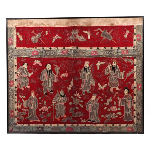 713 - A large Chinese silk embroidered panel decorated with figures in a landscape with bats and butterfli... 