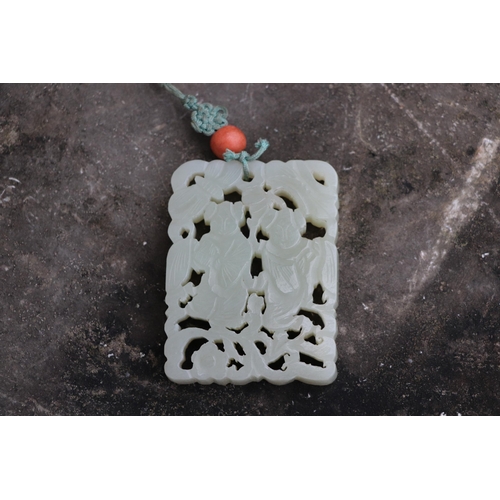 715 - A Chinese pierced jade pendant, 5 by 6.5cms.Condition ReportGood overall condition with no visible d... 