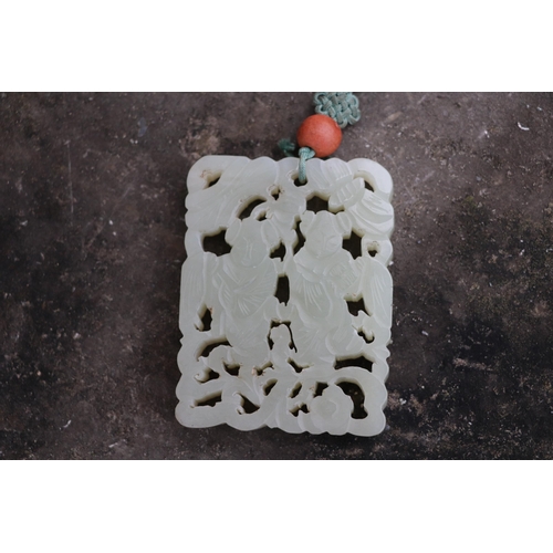 715 - A Chinese pierced jade pendant, 5 by 6.5cms.Condition ReportGood overall condition with no visible d... 