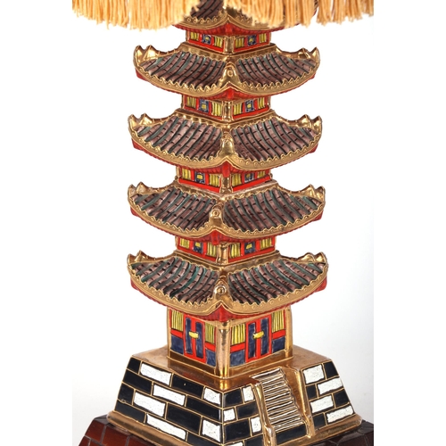 721 - A Japanese Satsuma table lamp in the form of a five-tier pagoda, overall 60cms high.