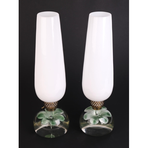 725 - A pair of Italian Murano Art glass table lamps of globular form with internal flower and large white... 