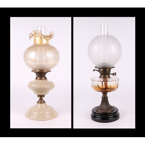 727 - A Victorian oil lamp; together with a creamware oil lamp (2).