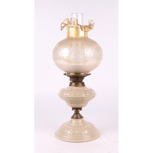 727 - A Victorian oil lamp; together with a creamware oil lamp (2).