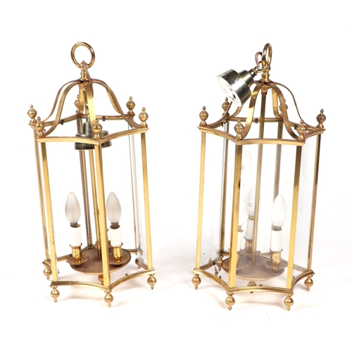 729 - A pair of Victorian style gilt brass and glass hall lanterns of converse hexagonal form, approx 65cm... 