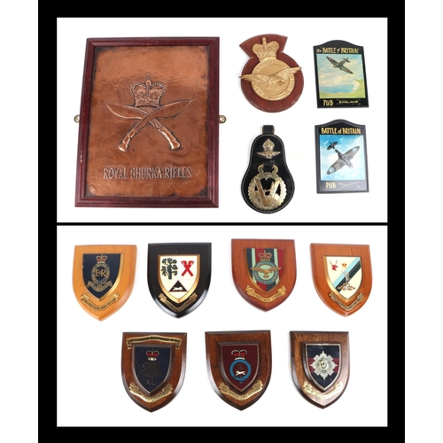 73 - Twelve military wall shields and plaques including: Royal Ghurka Rifles, Royal Air Force, Battle of ... 