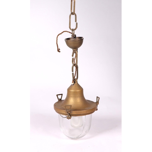 731 - A vintage brass industrial celling light with screw down glass shade, approx 35cm high.