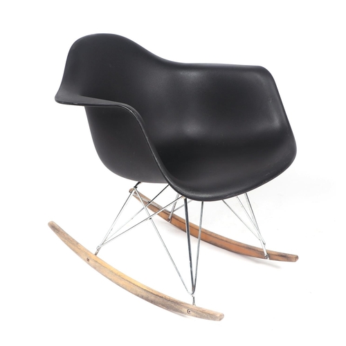 738 - A Ray & Charles Eames style rocking chair.