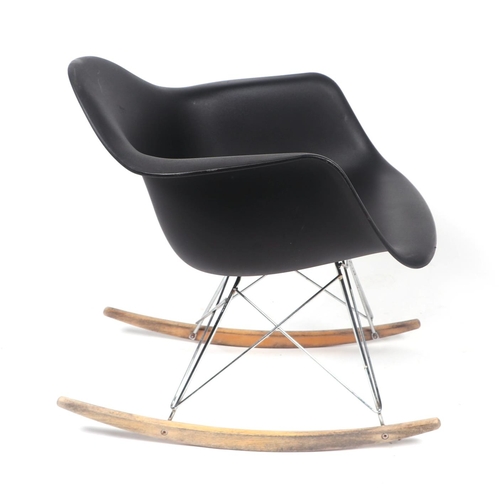 738 - A Ray & Charles Eames style rocking chair.