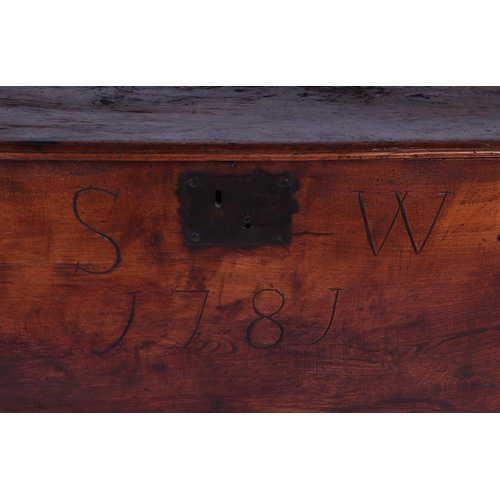 741 - An 18th century walnut six-plank coffer, the front inscribed 'S W 1781', 120cms wide.