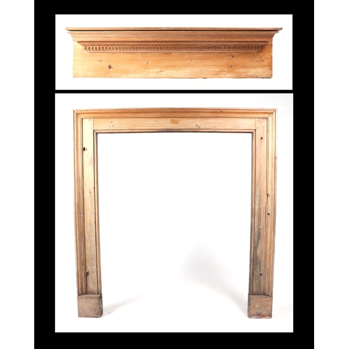 747 - A pine fire surround with mantle shelf, 106cm wide.