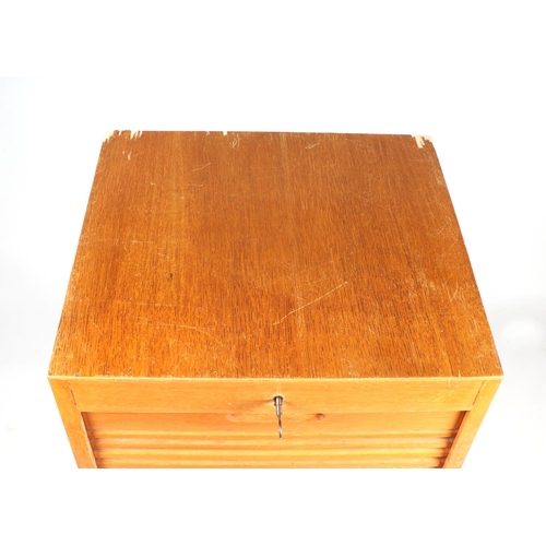 752 - An oak tambour fronted filing cabinet, 45cms wide.