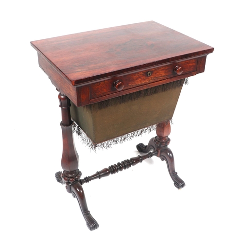 755 - An early 19th century rosewood work table with single frieze drawer, on baluster twin supports, 59cm... 