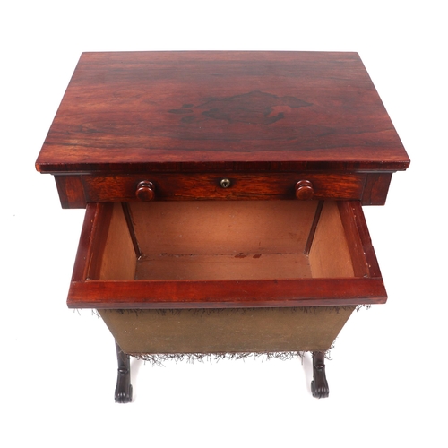 755 - An early 19th century rosewood work table with single frieze drawer, on baluster twin supports, 59cm... 