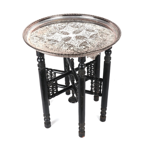 776 - A silver plated tray-top table, 51cms diameter.