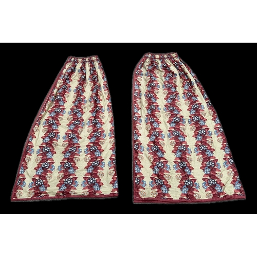 124A - A pair of lined curtains with floral decoration, 235cms drop and width 110cms (2).