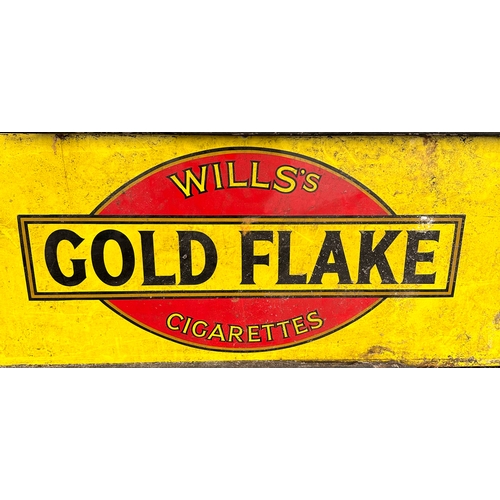 20 - An original enamel advertising sign - Wills Gold Flake Cigarettes - 183cm by 43cm.