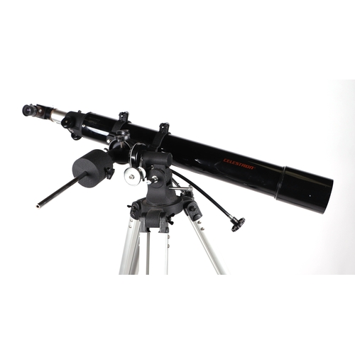 453 - A Celestron Firstscope 80EQ F-900mm F/11 model 21086 telescope on tripod.