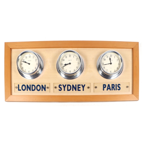 468 - Three modern World time clocks, London, Sydney and Paris, mounted on a board.