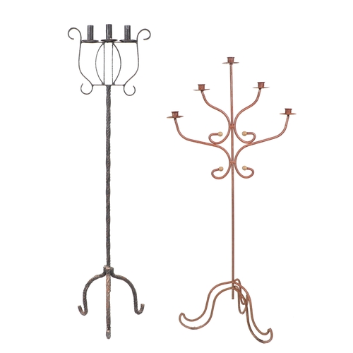 771 - A wrought iron five-branch candle stand, 109cms high; together with another similar, 123cms high (2)... 