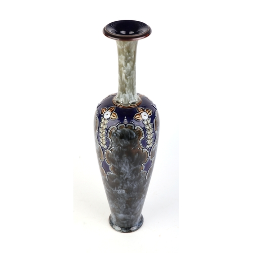 302 - A Royal Doulton stoneware Art Nouveau vase, 40cms high.