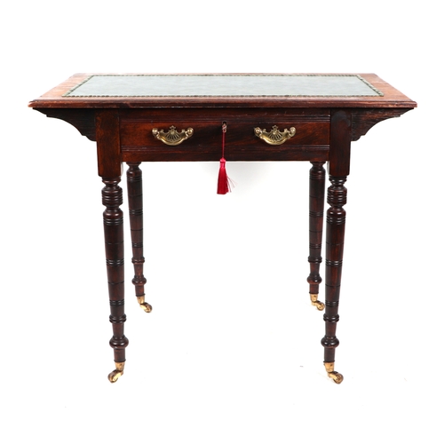 760 - An Edwardian mahogany writing table, the rectangular top with inset leather above a single frieze dr... 