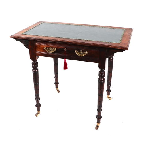 760 - An Edwardian mahogany writing table, the rectangular top with inset leather above a single frieze dr... 