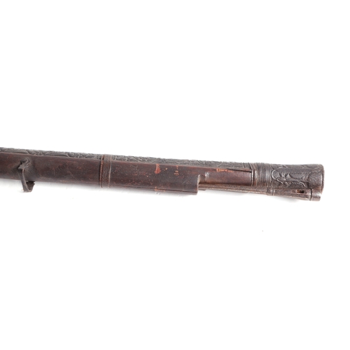 112 - An Indo-Persian Matchlock musket with ornate foliate scroll decoration, 153cms long.Condition Report... 