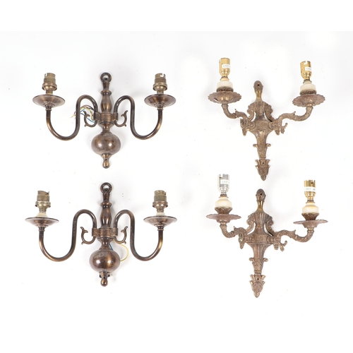 728 - A group of brass wall sconces and curtain tie-backs.